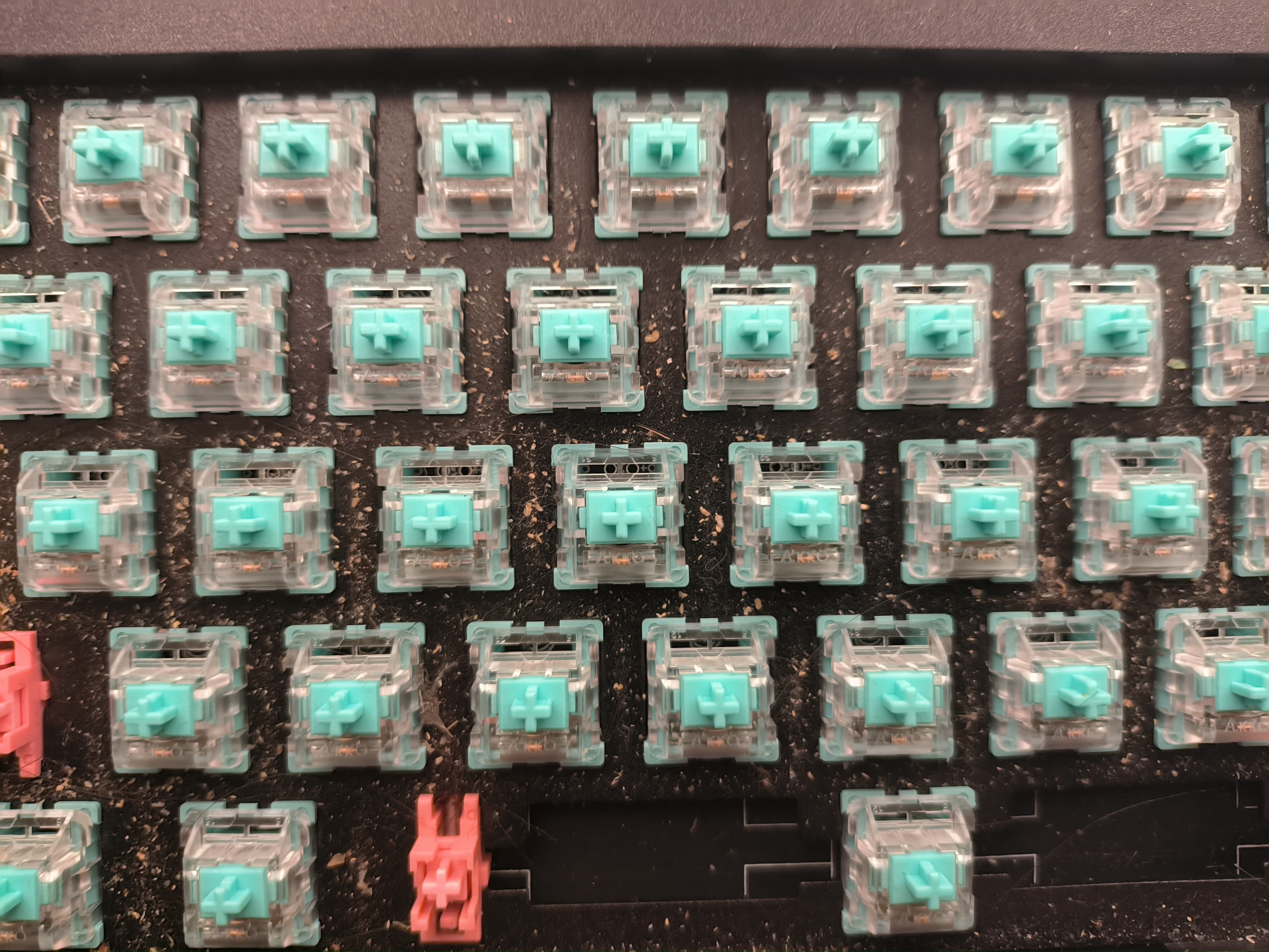 my keyboard without keycaps, with a lot of dirt